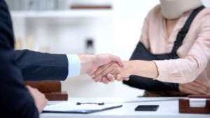 A victim of a bodily injury meets with a legal professional to discuss his options regarding liability.